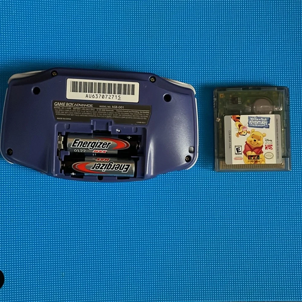 GAME BOY ADVANCE. PURPLE. BATTERY COVER MISSING. POOH GAME included